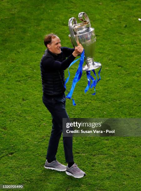 Thomas Tuchel, Manager of Chelsea celebrates with the Champions League Trophy following their team's victory in the UEFA Champions League Final...