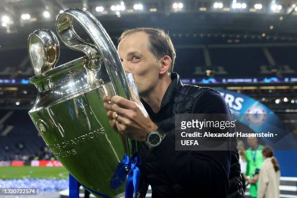 Thomas Tuchel, Manager of Chelsea kisses the Champions League Trophy following their team's victory in the UEFA Champions League Final between...