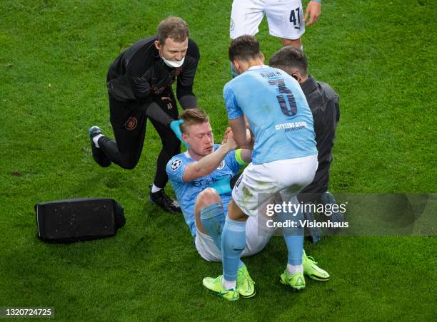 Kevin De Bruyne of Manchester City is substituted after receiving a head injury during the UEFA Champions League Final between Manchester City and...