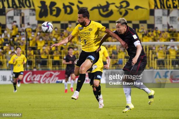 Cristiano of Kashiwa Reysol takes on Akito Fukumori of Consadole Sapporo during the J.League Meiji Yasuda J1 match between Kashiwa Reysol and...