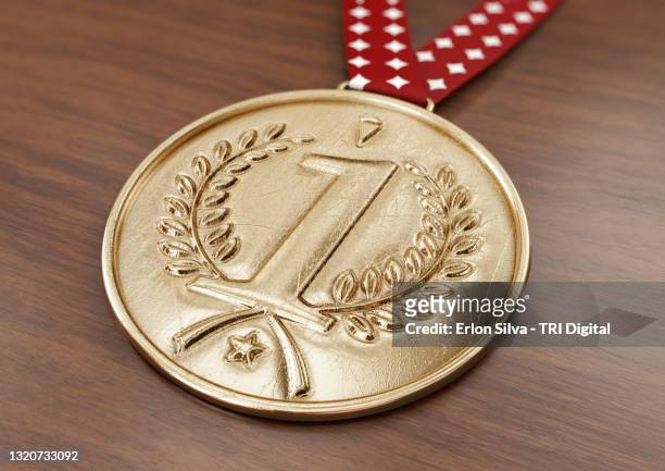 first place medal for sports awards or business challenges - sportsperson medal stock pictures, royalty-free photos & images