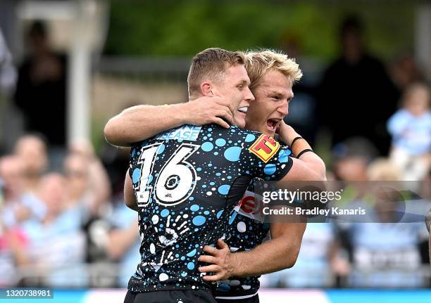 Jack Williams of the Sharks celebrates with team mate Aiden Tolman after scoring a try during the round 12 NRL match between the Cronulla Sharks and...