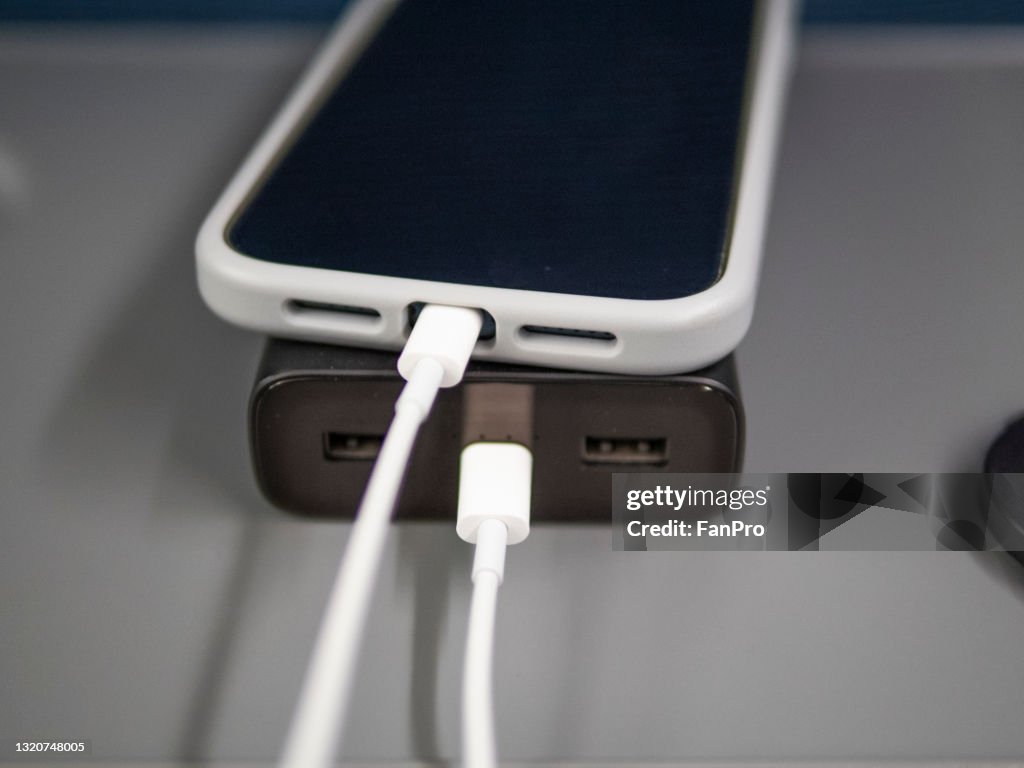 Use a power bank to charge your phone