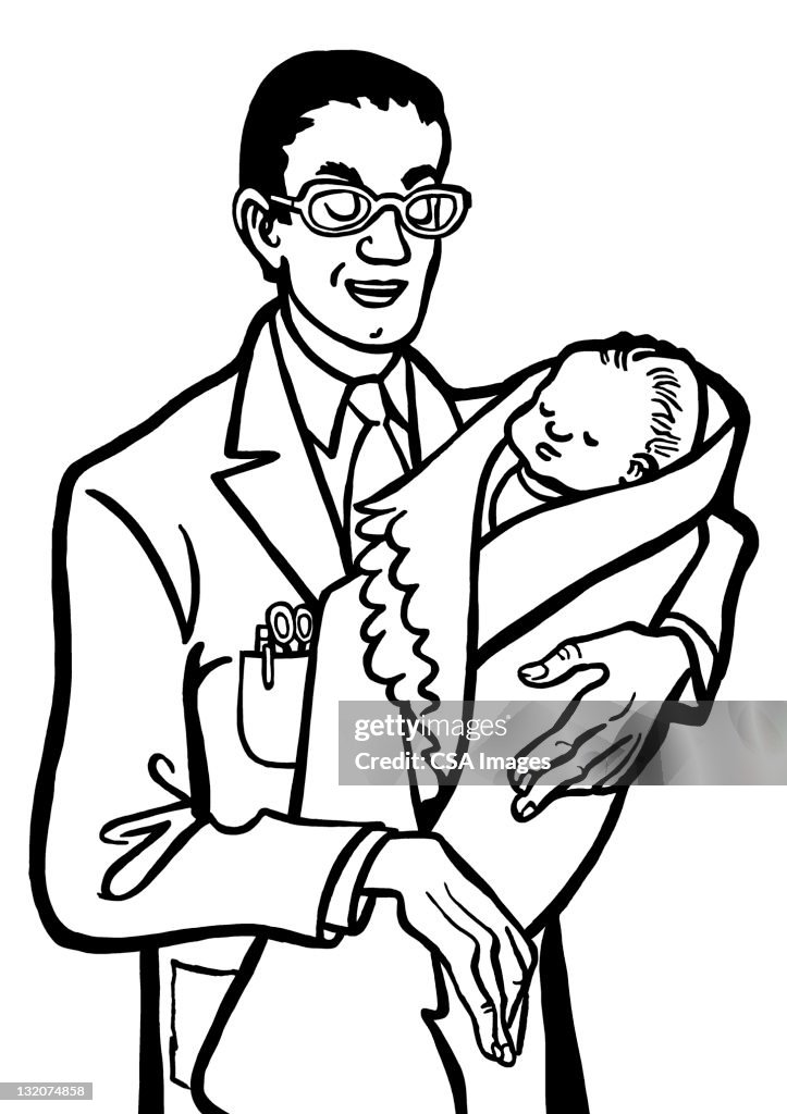 Medico tenendo bambino