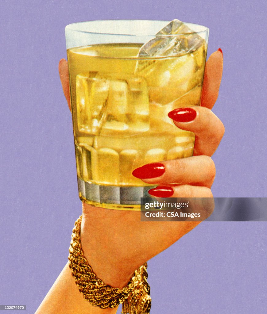 Woman's Hand Holding Drink