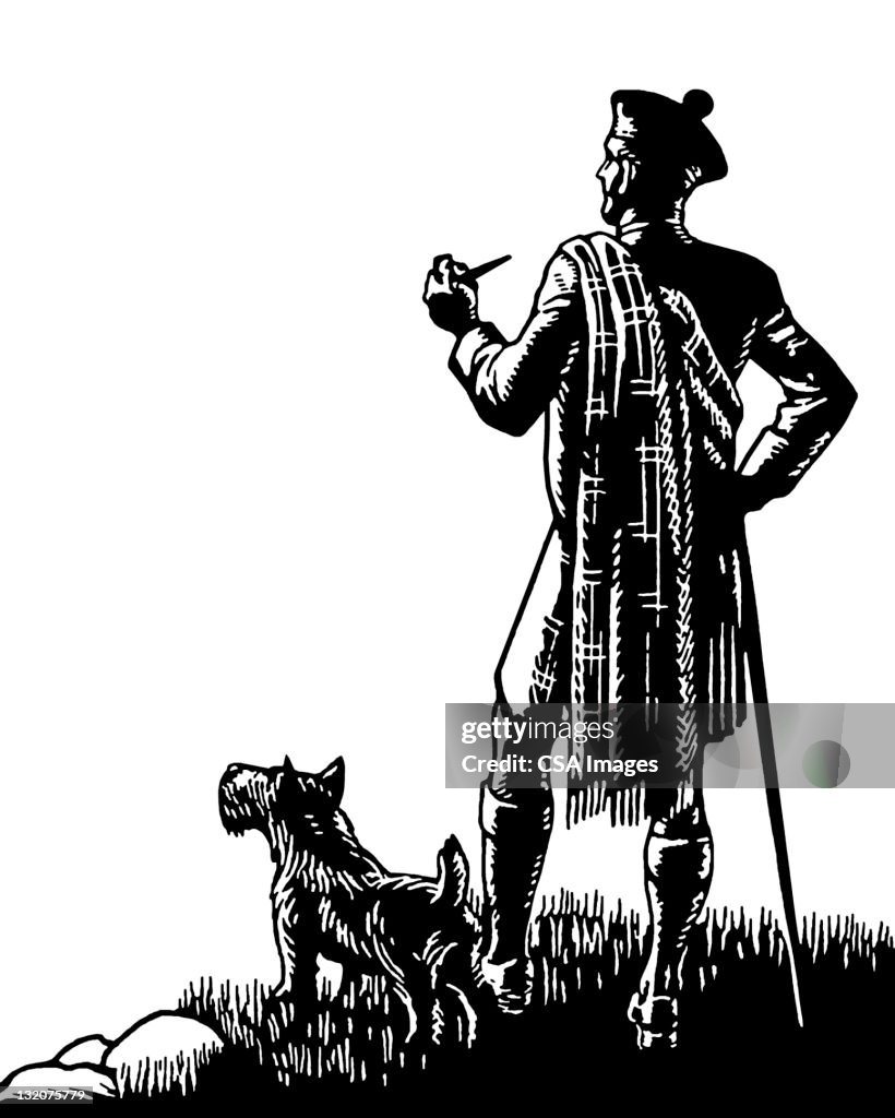 Hombre y su perro escocés