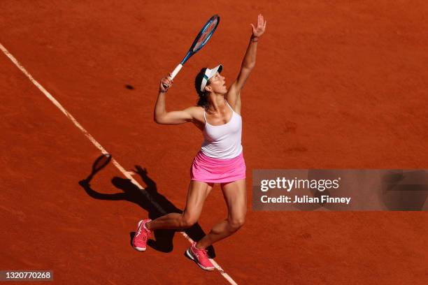 Patricia Maria Tig of Romania serves in her First Round match against Naomi Osaka of Japan during Day One of the 2021 French Open at Roland Garros on...