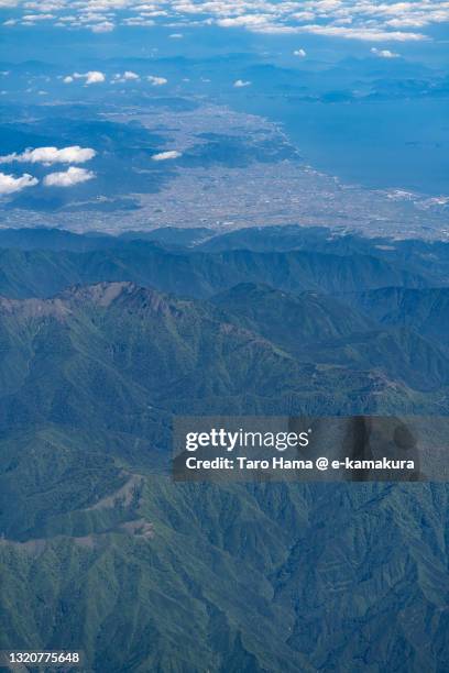 imabari and saijo cities in ehime prefecture of japan aerial view from airplane - saijo ehime stock pictures, royalty-free photos & images