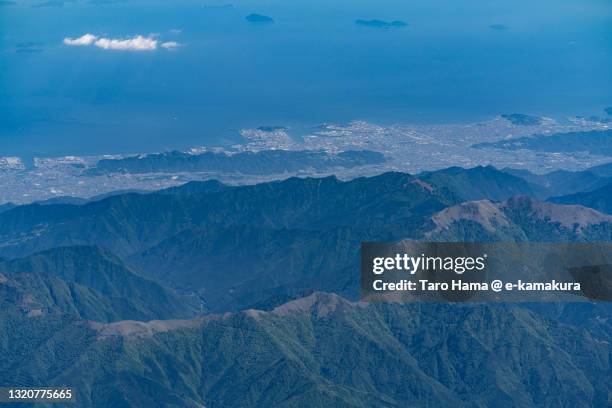 saijo and niihama cities in ehime prefecture of japan aerial view from airplane - saijo ehime stock pictures, royalty-free photos & images