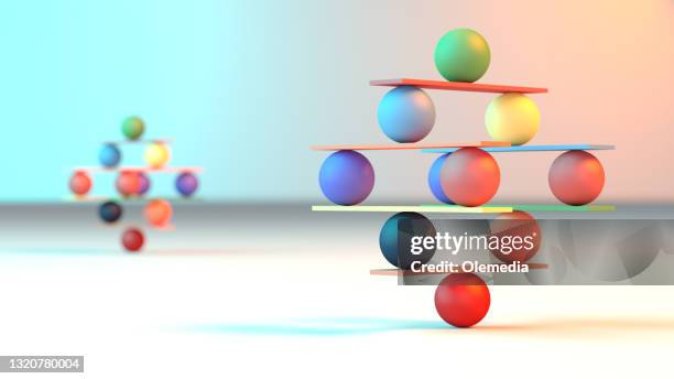 jenga game color block tower with balls - block removal game stock pictures, royalty-free photos & images
