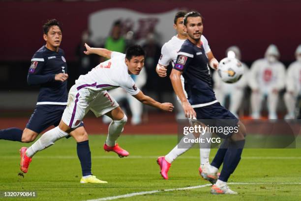 Wu Lei of China shoots the ball during the FIFA World Cup Asian qualifier second round match between China and Guam at Suzhou Olympic Sports Centre...