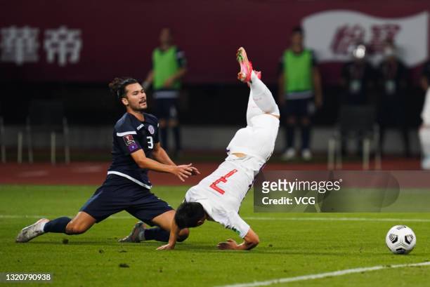 Wu Lei of China falls down during the FIFA World Cup Asian qualifier second round match between China and Guam at Suzhou Olympic Sports Centre...
