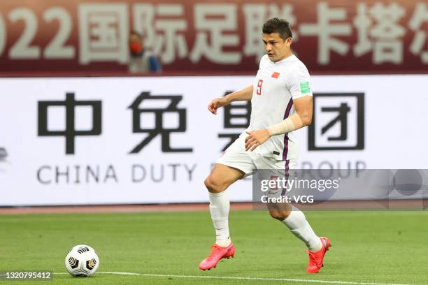 Elkeson of China drives the ball during the FIFA World Cup Asian qualifier Group A second round match between China and Guam at Suzhou Olympic Sports...