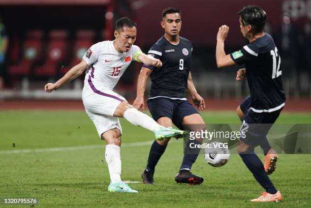 Wu Xi of China kicks the ball during the FIFA World Cup Asian qualifier Group A second round match between China and Guam at Suzhou Olympic Sports...
