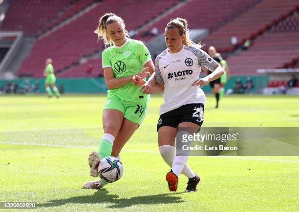 Fridolina Rolfo of VfL Wolfsburg battles for possession with Laura Storzel of Eintracht Frankfurt during the Women's DFB Cup Final match between...