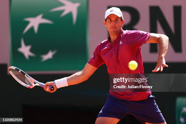 Dominic Thiem of Austria plays a forehand in his First Round match against Pablo Andujar of Spain during Day One of the 2021 French Open at Roland...