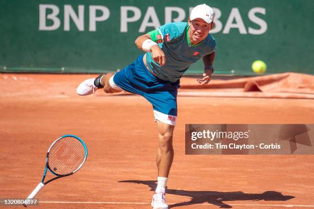 May 30. Kei Nishikori of Japan loses the grip of his tennis racquet while serving against Alessandro Giannessi of Italy, Nishikori managed to...