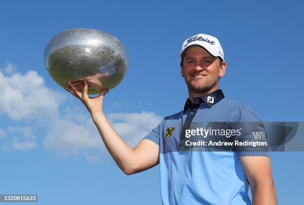 Bernd Wiesberger of Austria celebrates with the winners trophy after the final round of the Made in HimmerLand presented by FREJA at Himmerland Golf...