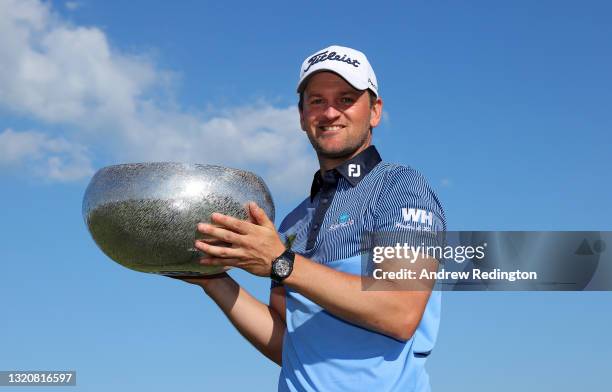 Bernd Wiesberger of Austria celebrates with the winners trophy after the final round of the Made in HimmerLand presented by FREJA at Himmerland Golf...