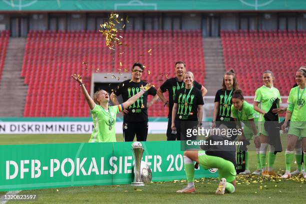 Alexandra Popp of VfL Wolfsburg celebrates with the DFB Cup following victory in the Women's DFB Cup Final match between Eintracht Frankfurt and VfL...