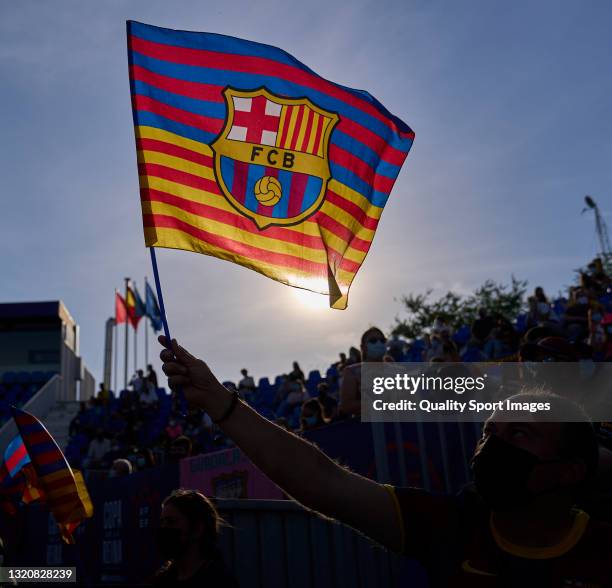 Fans of FC Barcelona hold a flag prior to the Copa de la Reina Final match between Levante UD and FC Barcelona at Estadio Municipal de Butarque at...