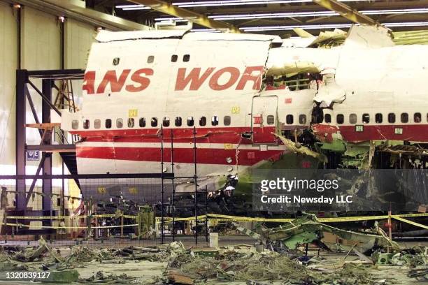 The side of the Boeing 747, from TWA Flight 800, on which the center fuel tank ruptured, killing 230 people off Long Island, is shown on July 8, 1999...