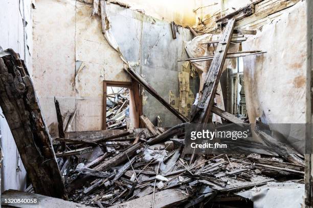collapsed ceiling in an abandoned building - collapsing stock pictures, royalty-free photos & images