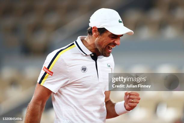 Jeremy Chardy of France celebrates in his First Round match against Stefanos Tsitsipas of Greece during Day One of the 2021 French Open at Roland...