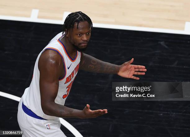 Julius Randle of the New York Knicks reacts against the Atlanta Hawks during game four of the Eastern Conference Quarterfinals at State Farm Arena on...