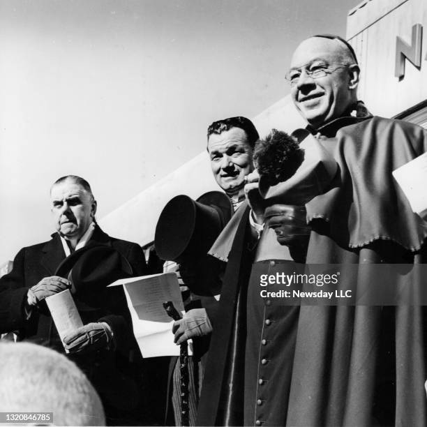 Rev. Joseph Smith, John Gilhooly, and Bishop Walter P. Kellenberg on the reviewing stand of the St. Patrick's Day parade in Hempstead, New York on...