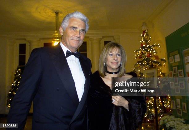 Barbra Streisand and her husband James Brolin arrive at the White House December 20, 2000 in Washington, DC. Earlier in the day, Streisand recieved a...