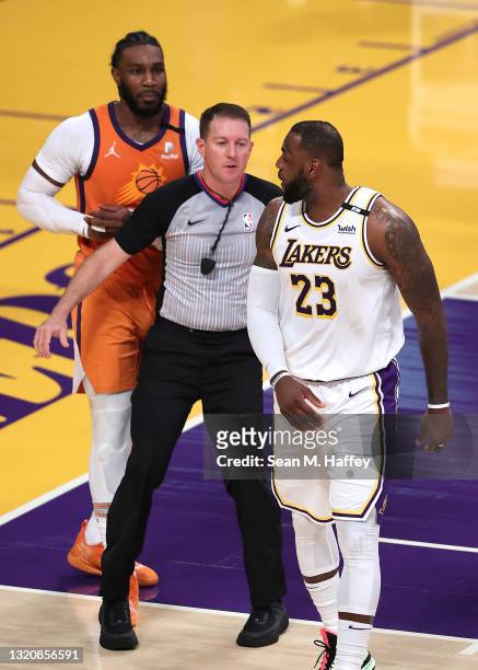 Referee Brent Barnaky seperates LeBron James of the Los Angeles Lakers and Jae Crowder of the Phoenix Suns during the second half of Game Four of the...