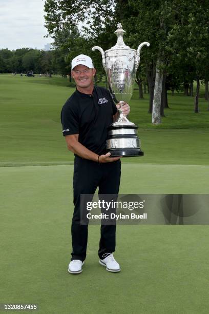 Alex Cejka of Germany poses with the trophy after winning the Senior PGA Championship at Southern Hills Country Club on May 30, 2021 in Tulsa,...