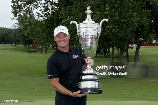 Alex Cejka of Germany poses with the trophy after winning the Senior PGA Championship at Southern Hills Country Club on May 30, 2021 in Tulsa,...