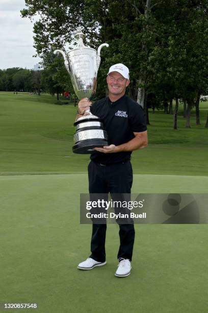 Alex Cejka of Germany poses with the trophy after winning the Senior PGA Championship at Southern Hills Country Club on May 30, 2021 in Tulsa,...