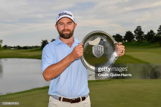 Cameron Young holds the trophy after winning the Evans Scholars Invitation at the Glen Club on May 30, 2021 in Glenview, Illinois.