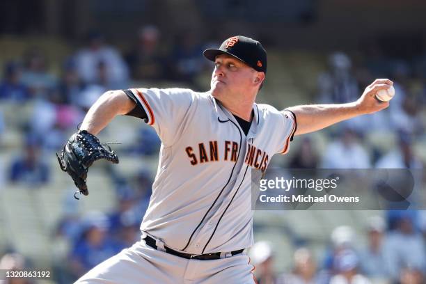 Jake McGee of the San Francisco Giants pitches against the Los Angeles Dodgers during the ninth inning at Dodger Stadium on May 30, 2021 in Los...