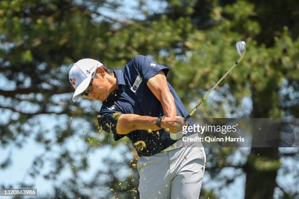 Whee Kim plays his tee shot on the 14th hole during the final round of the Evans Scholar Invitational at the Glen Club on May 30, 2021 in Glenview,...