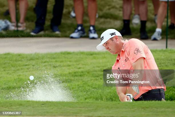 Jason Kokrak hits from the bunker on the 16th hole during the final round of the Charles Schwab Challenge at Colonial Country Club on May 30, 2021 in...