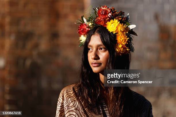 Indigenous model Lisa Fatnowna poses at the Welcome To Country for Afterpay Australian Fashion Week 2021 at the Blacksmith's Workshop, Carriageworks...