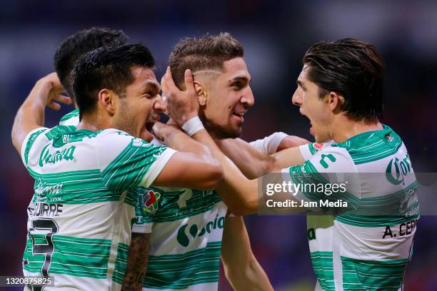 Diego Valdes of Santos celebrates with teammates after scoring his team's first goal during the Final second leg match between Cruz Azul and Santos...