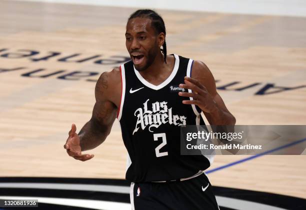 Kawhi Leonard of the LA Clippers reacts against the Dallas Mavericks in the third quarter in Game Four of the Western Conference first round series...