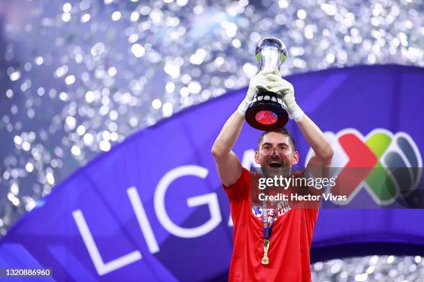 José de Jesús Corona goalkeeper of Cruz Azul lifts the champion's trophy at the end the Final second leg match between Cruz Azul and Santos Laguna as...