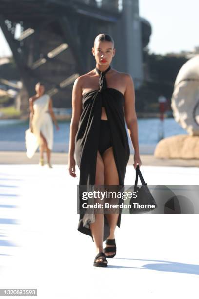 Model walks the runway during the BONDI BORN show during Afterpay Australian Fashion Week 2021 Resort '22 Collections at the Northern Wharf...