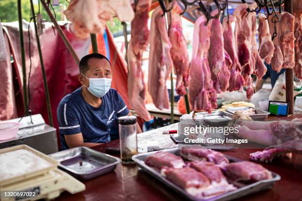 Vendor sells pork at an open market on May 31, 2021 in Wuhan, China. A renewed interest in the origins of COVID-19 has emerged after U.S. President...