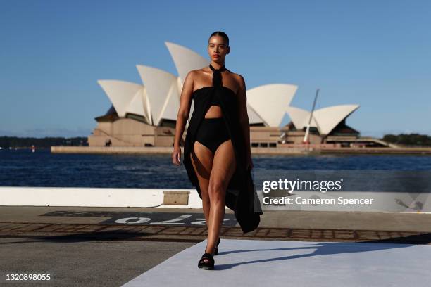 Model walks the runway during the BONDI BORN show during Afterpay Australian Fashion Week 2021 Resort '22 Collections at the Northern Wharf...