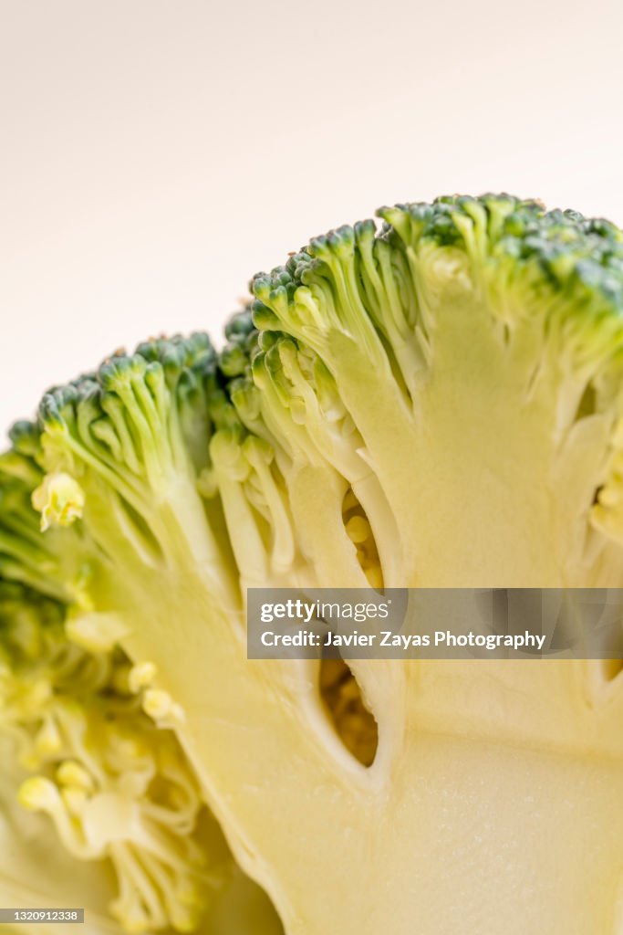 Close-Up Of Sliced Broccoli Against Pastel Background