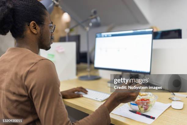 architect working late on some digital blueprint using computer - cad drawing stock pictures, royalty-free photos & images