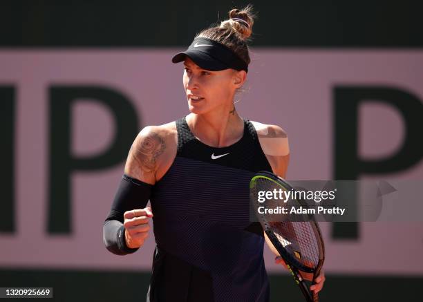 Polona Hercog of Slovenia celebrates in their ladies singles first round match against Kiki Bertens of The Netherlands on day two of the 2021 French...