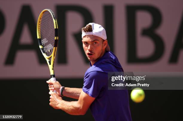 Maximilian Marterer of Germany plays a backhand in their mens singles first round match against Filip Krajinovic of Serbia on day two of the 2021...
